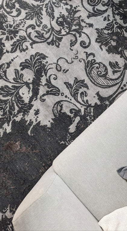 Authentic oriental rug with a damask pattern in beige and brown