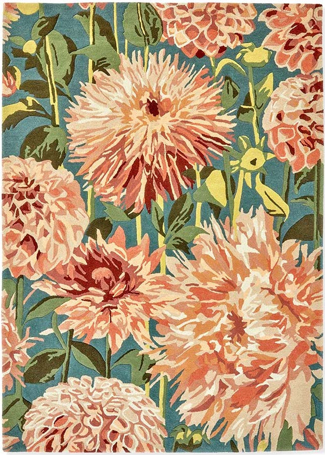 floral wool rug in orange, green, cream and blue
