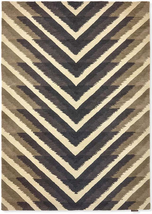 geometric wool rug in brown, beige and black
