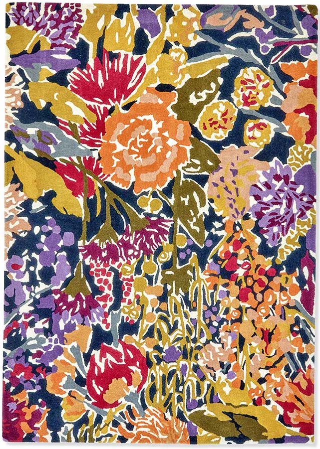 floral rug in orange, purple, green and blue
