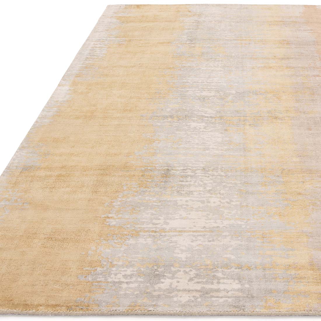 modern gold and beige area rug with abstract design
