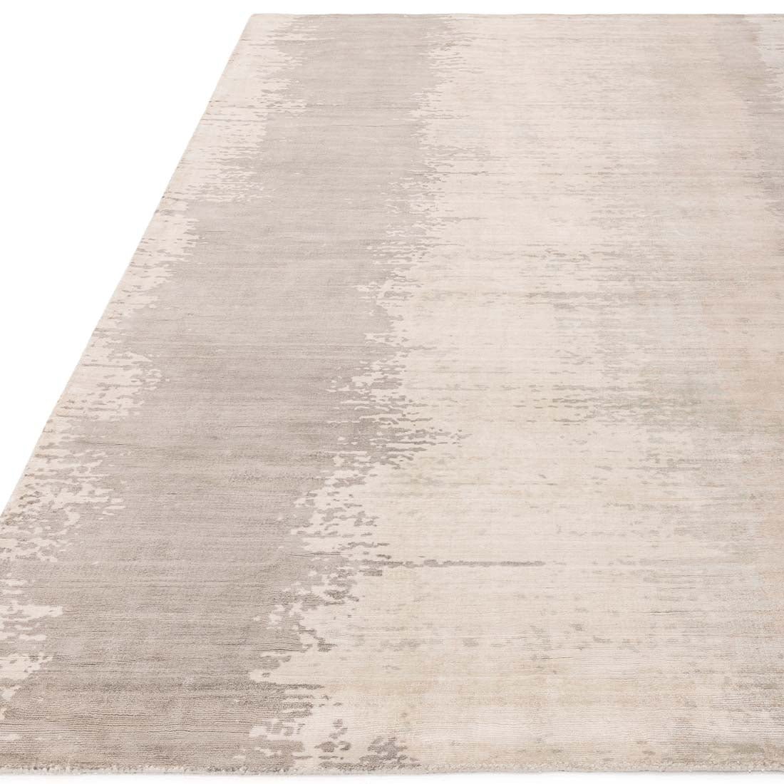 modern grey and beige area rug with abstract design
