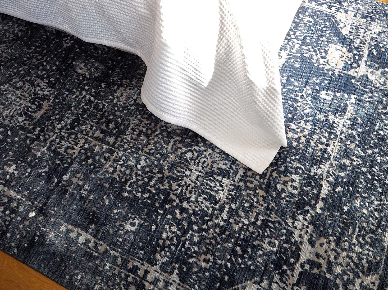 Persian style area rug in navy and grey
