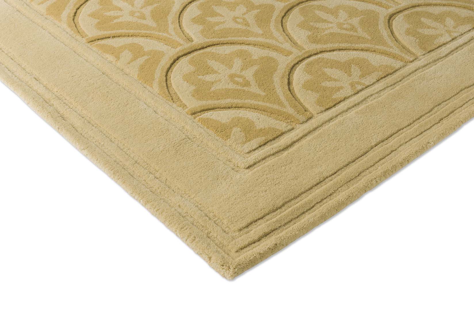 Modern gold wool rug with leaf motif 
