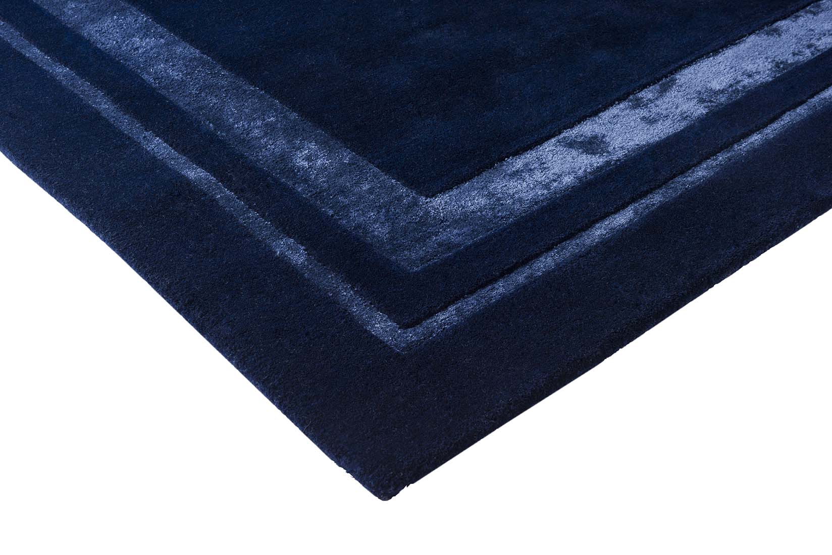 Plain blue wool and viscose rug 
