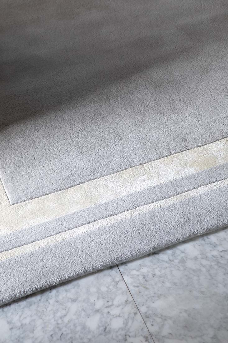 Plain grey and silver wool and viscose rug 
