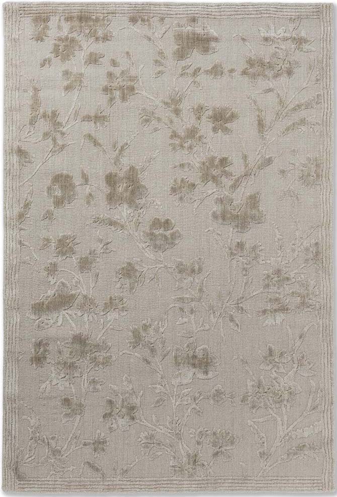 Bamboo silk, cotton and wool rug in beige with floral design.
