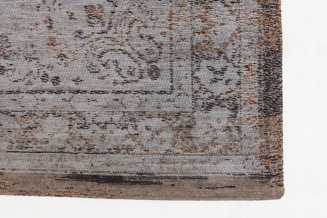 Grey and brown flatweave rug with faded persian medallion pattern