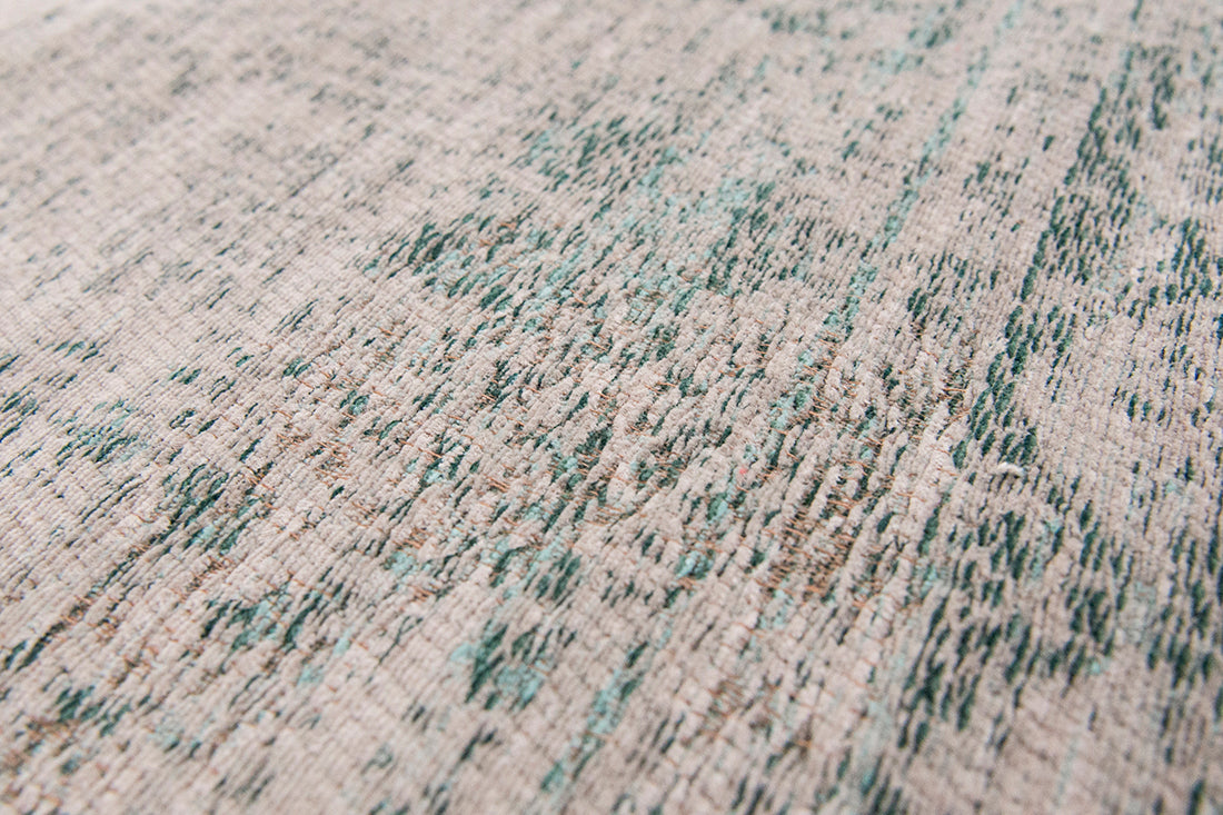 Grey flatweave rug with faded green persian design