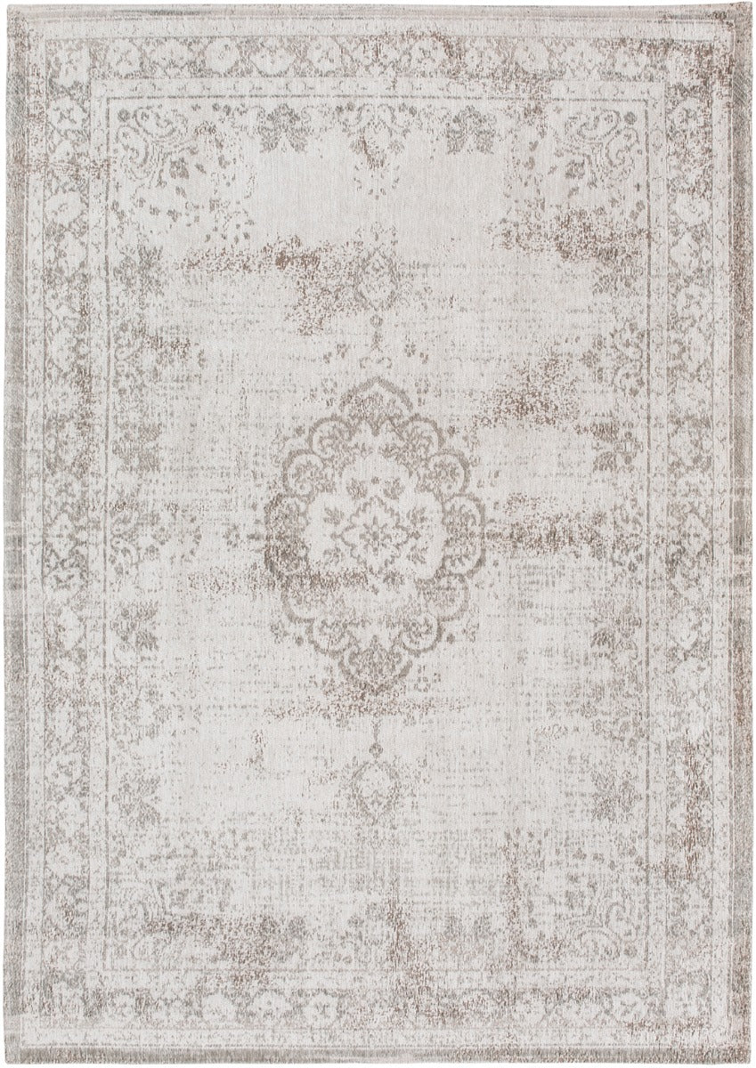 Grey rug with faded persian design