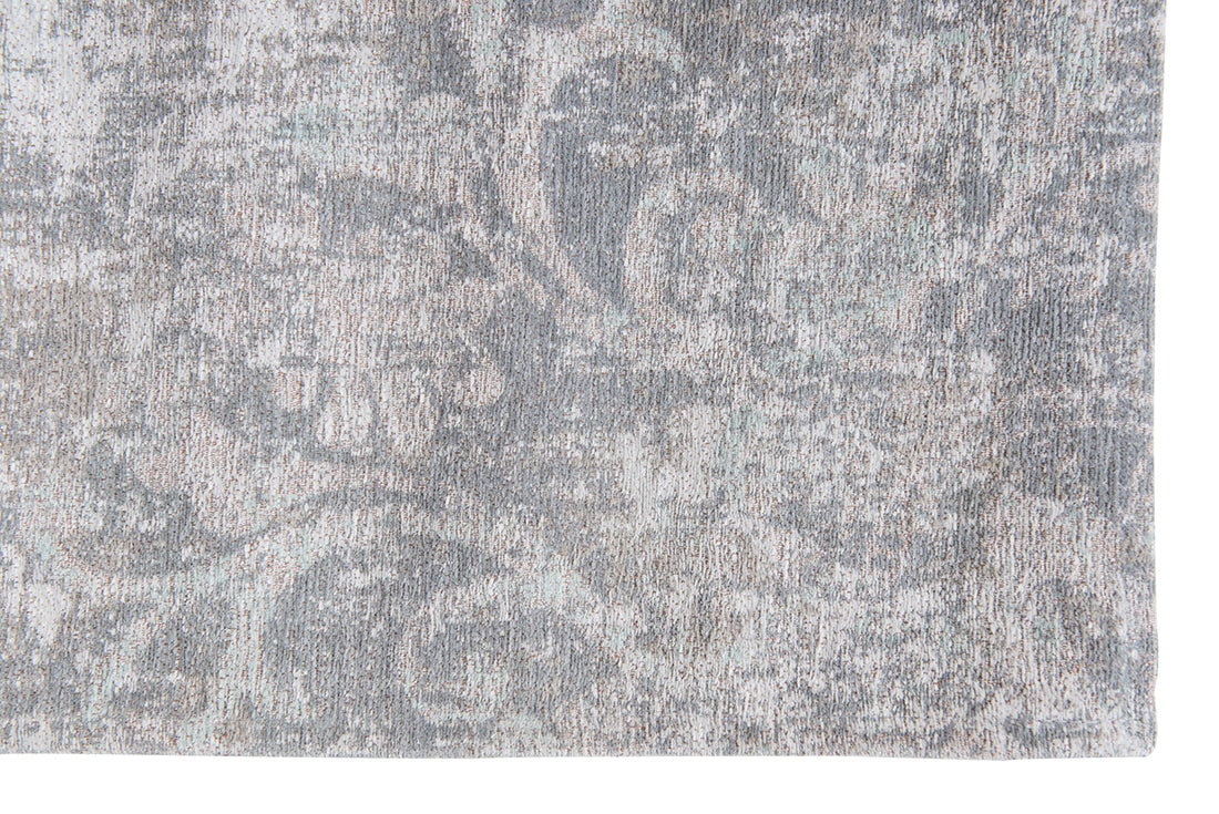 Ivory flatweave with faded floral and arabic pattern in grey