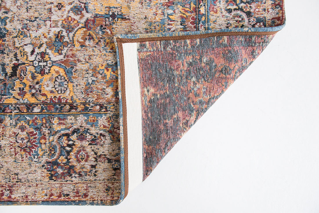 Flatweave rug with faded persian design in blue