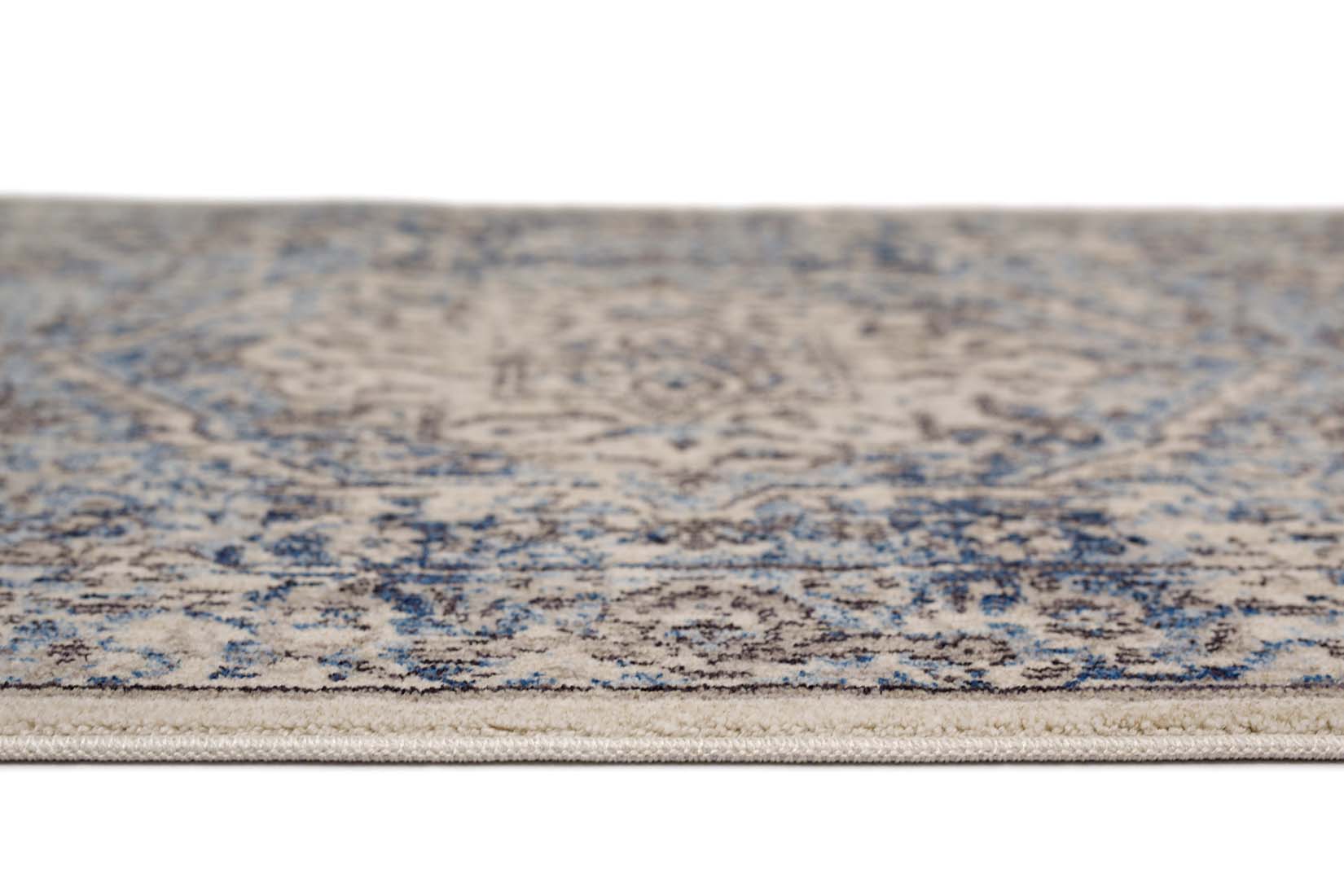 Persian style area rug in blue and grey
