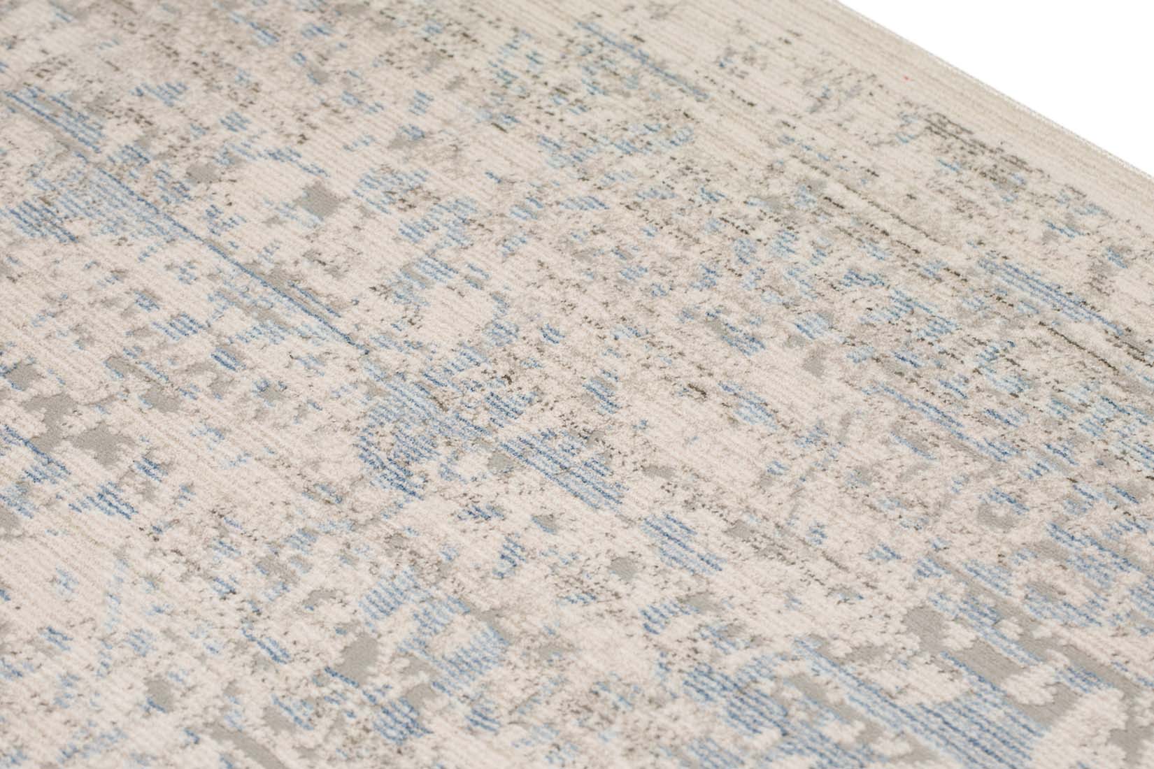 Persian style area rug in blue and grey
