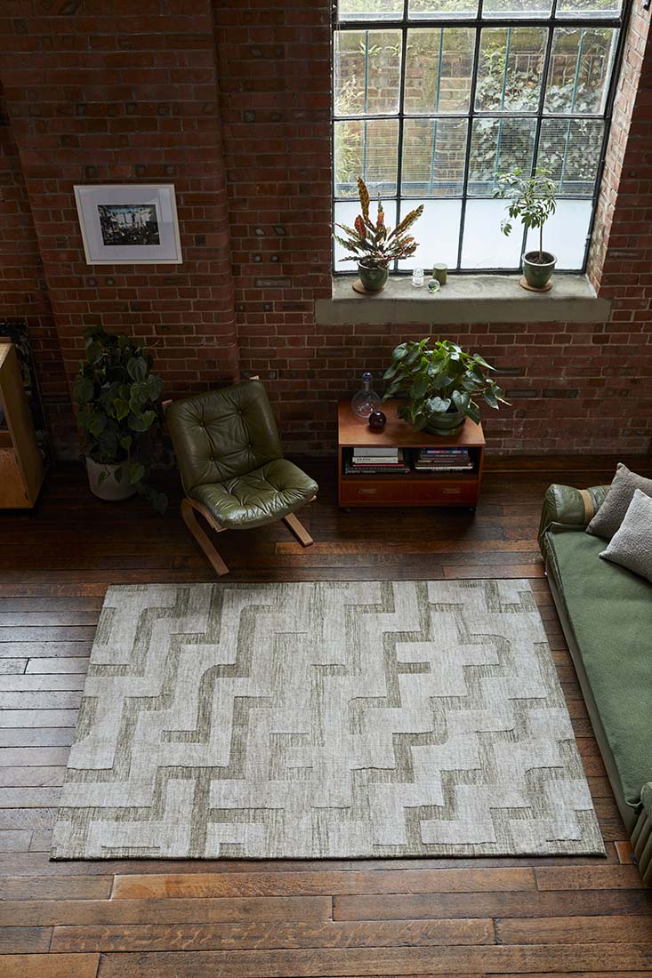 beige and green geometric polyester rug
