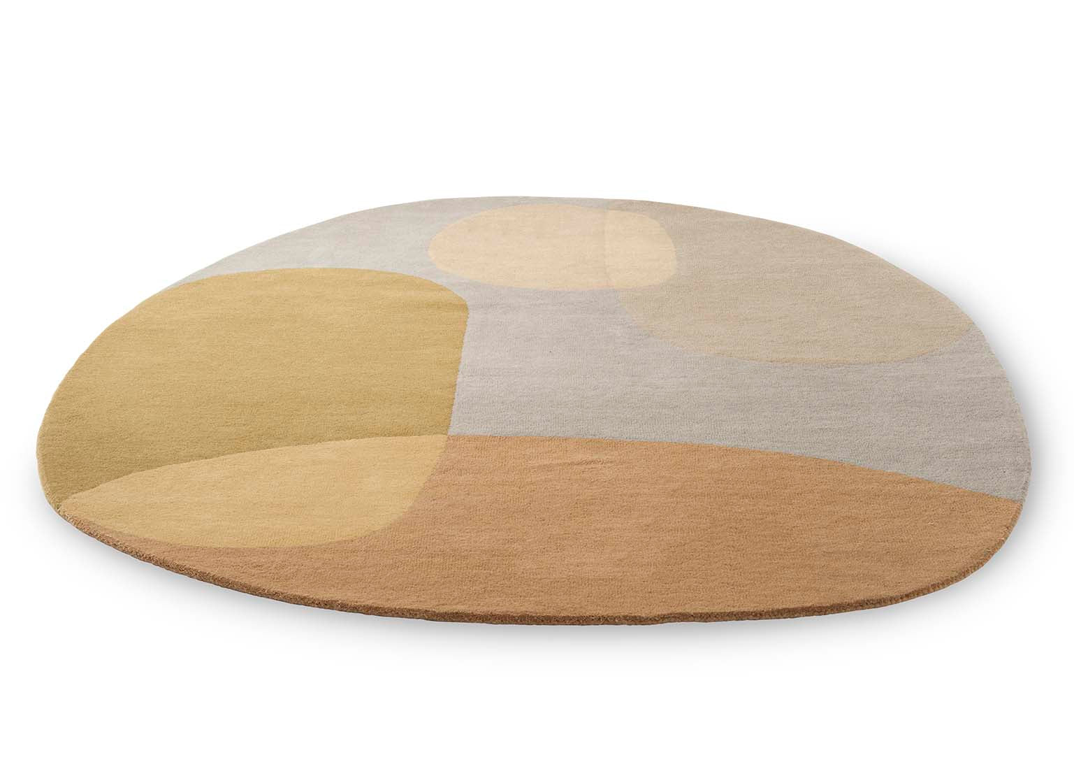 multicolour oval shaped wool rug with abstract design 
