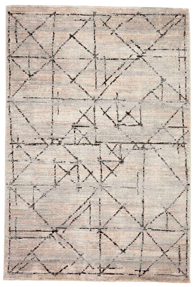 Beige rug with black geometric pattern
