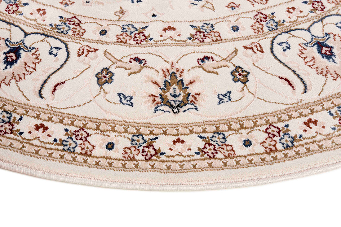 Traditional Persian Nain style round rug. White with a detailed medallion pattern and border.
