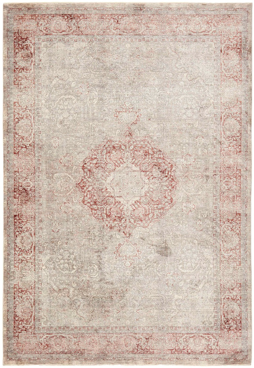 Traditional style rug with beige backing and red patterned border design
