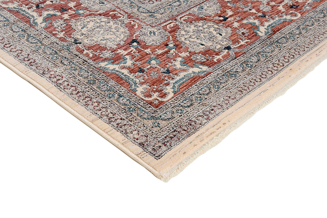 Traditional style rug with cream backing and red patterned border design
