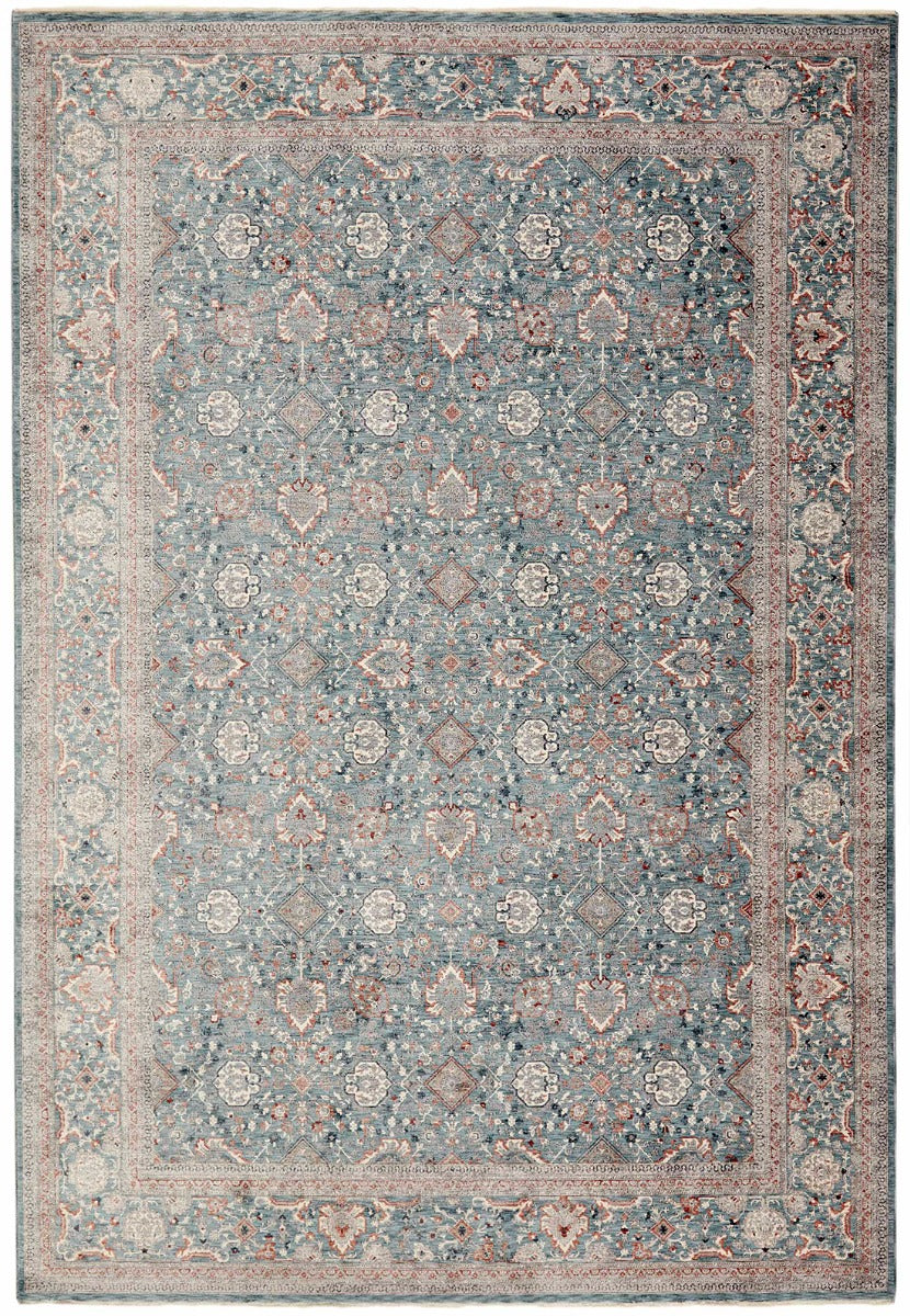 Traditional style rug with green backing and patterned border design
