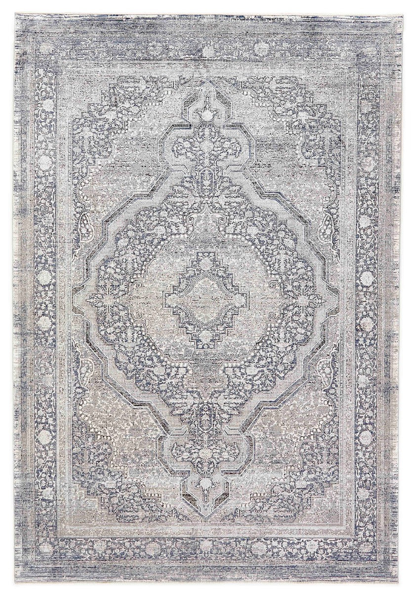 Blue rectangle rug with abstract pattern and classic bordered design
