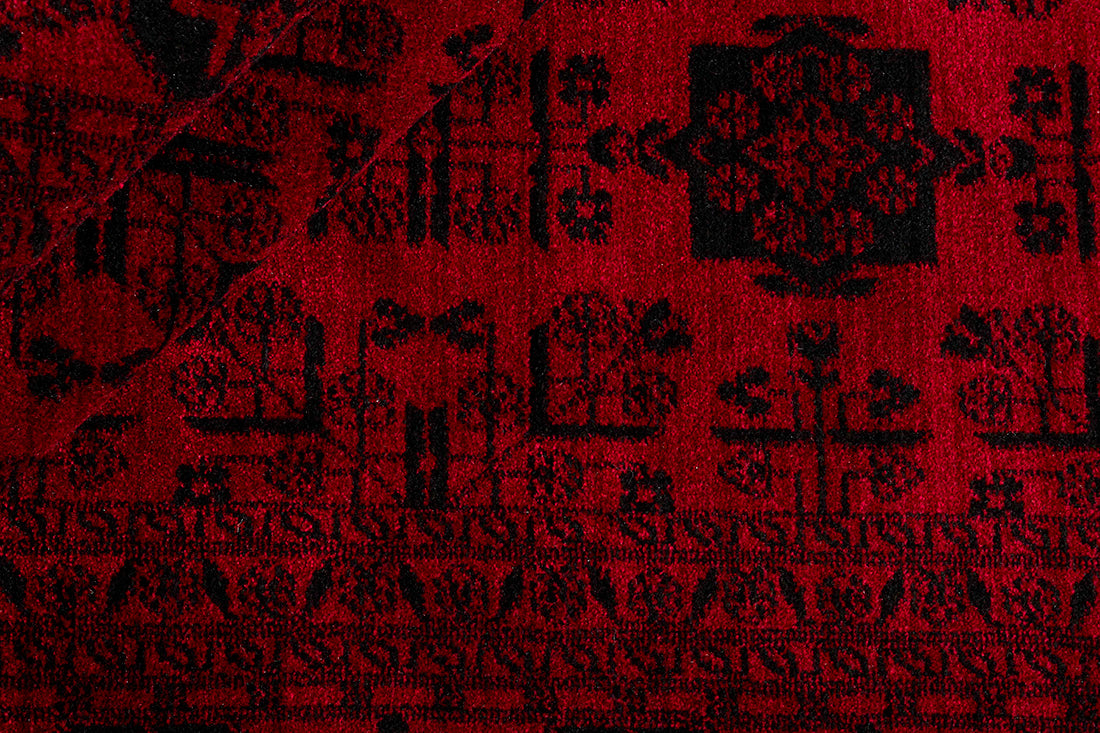 Printed Persian style red rug with black print 
