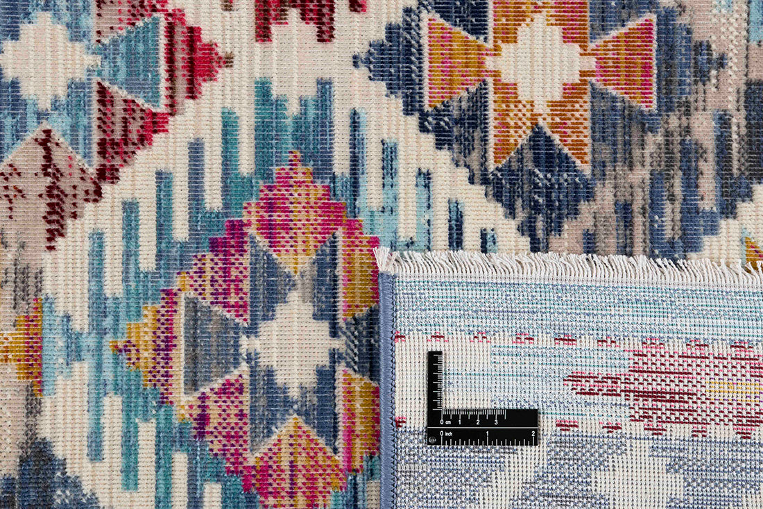 Traditional style Kilim rug with a blue border and multicolour pattern
