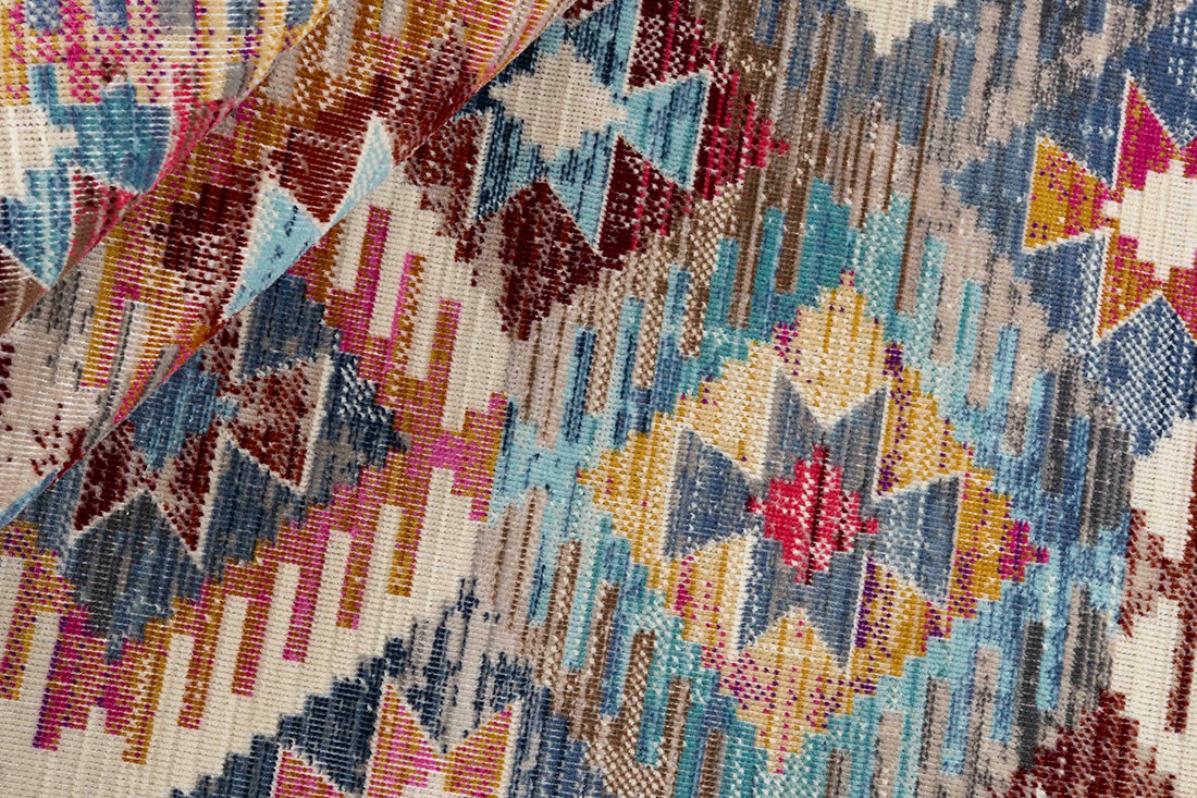 Traditional style Kilim rug with a blue border and multicolour pattern
