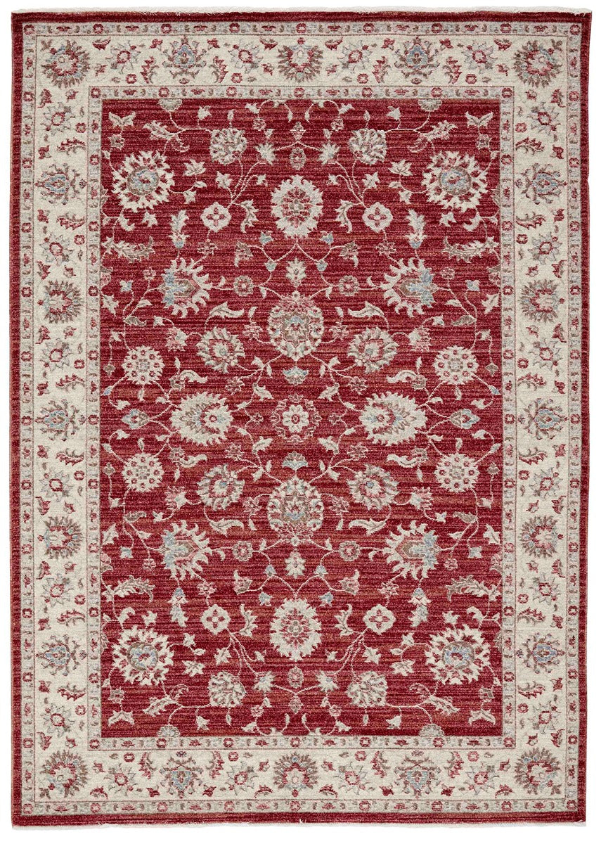 Traditional red Ziegler-style rug with floral motif 
