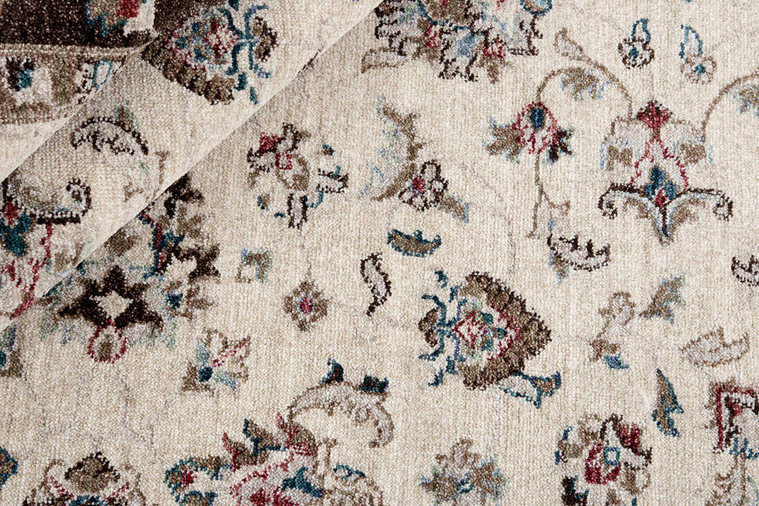 Traditional brown Ziegler-style rug with floral motif 

