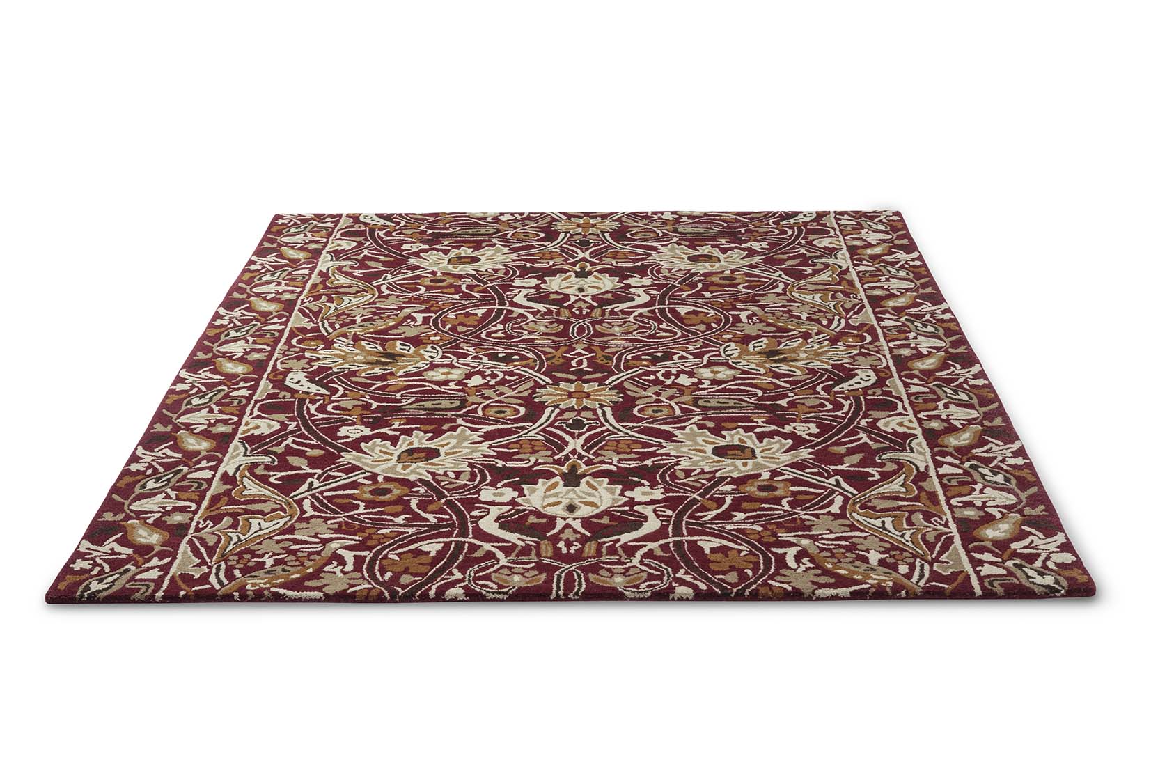 red and gold wool rug with floral print
