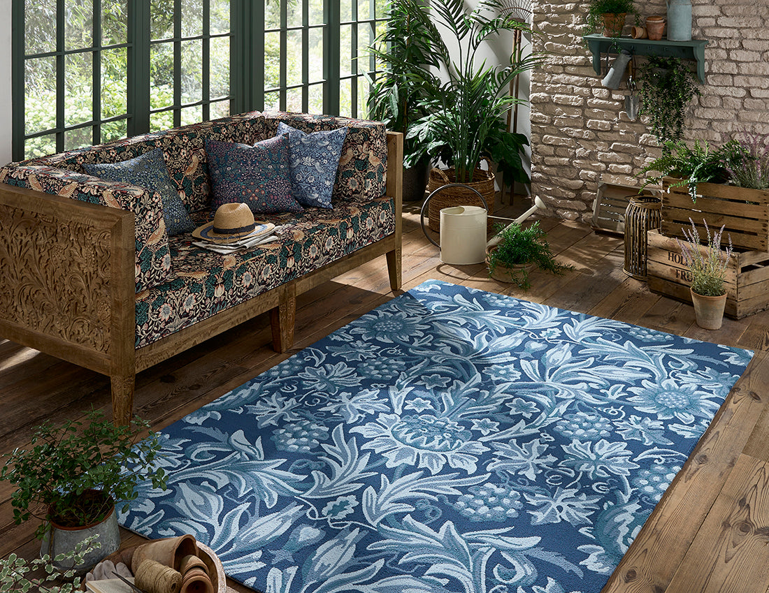 blue indoor/outdoor rug with floral pattern
