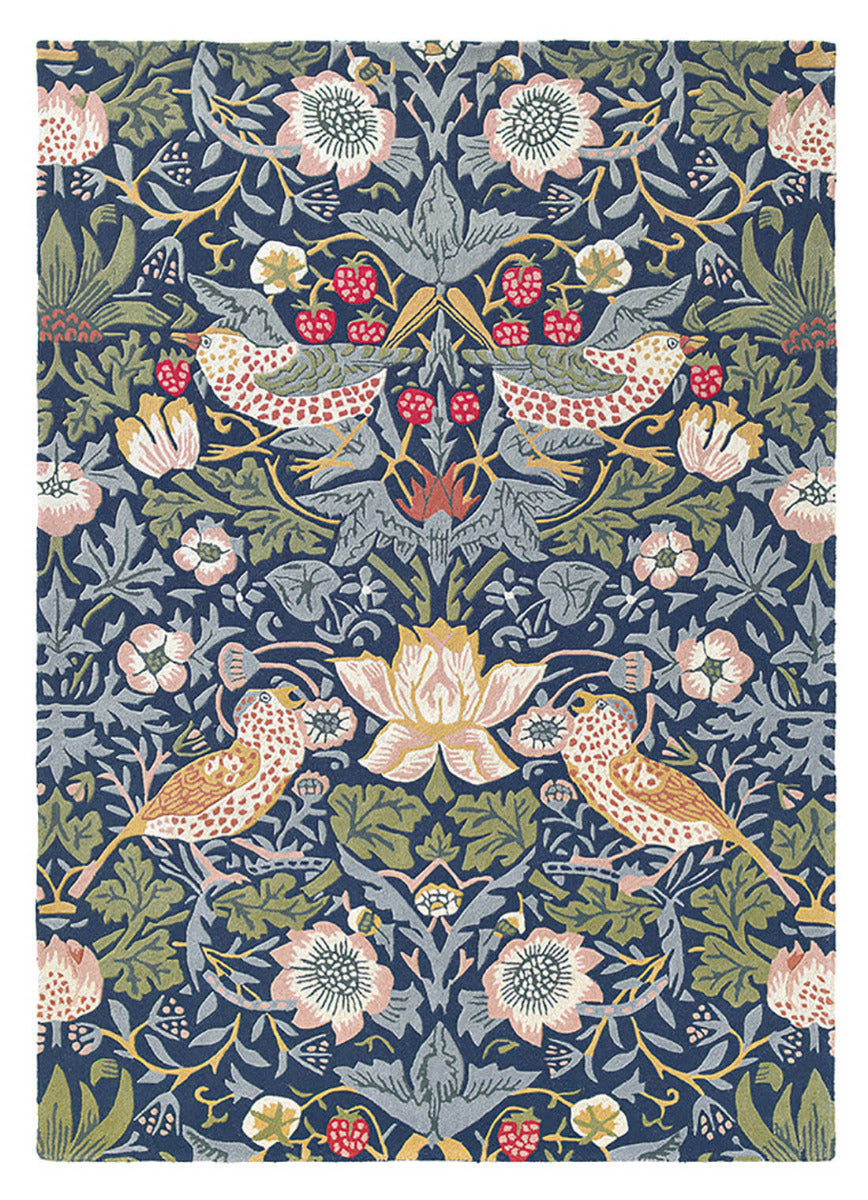 Wool rug with floral bird design in blue, red and green