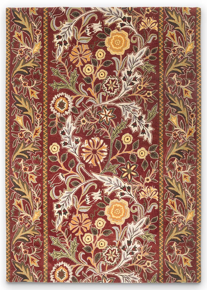 red wool rug with multicolour floral design
