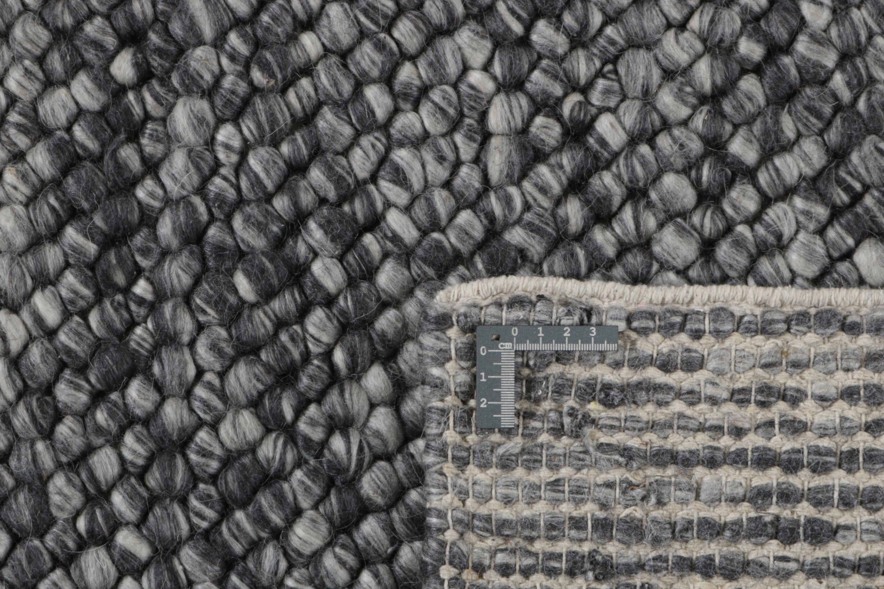 Large plain grey and black  rug
