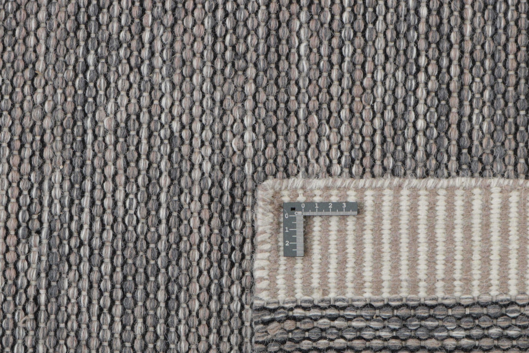 plain grey and beige flatweave rug
