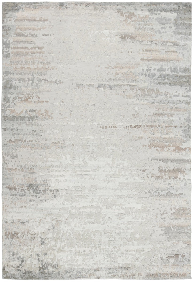 Area rug with  abstract design in grey and beige