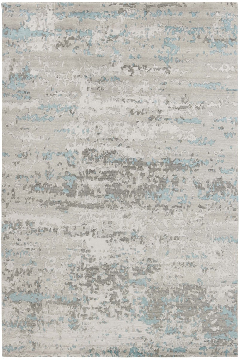 Area rug with  abstract design in grey and beige