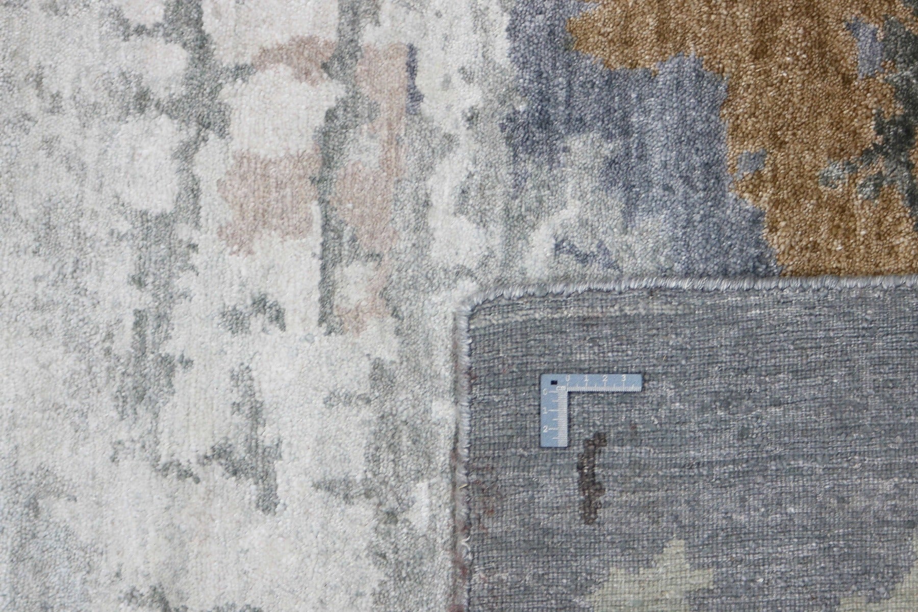  beige and grey abstract rug
