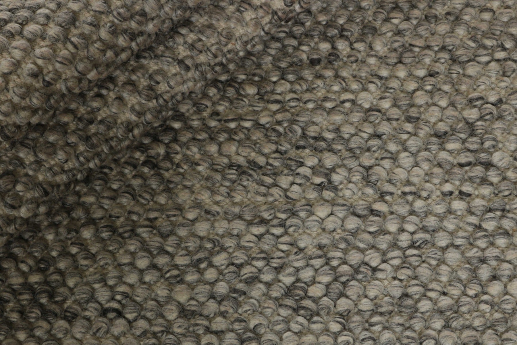 grey and brown textured rug
