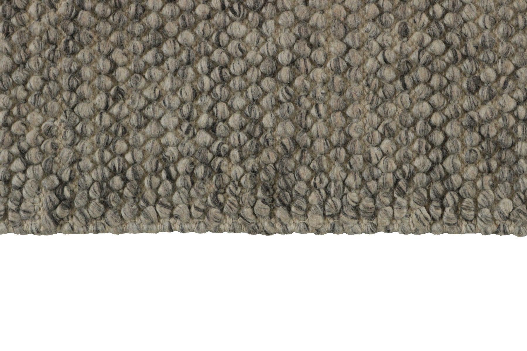 grey and brown textured rug
