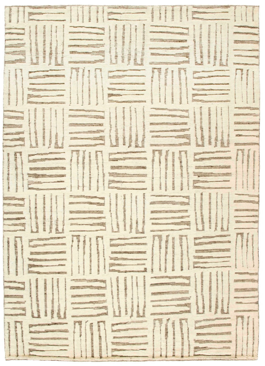 beige area rug with geometric pattern
