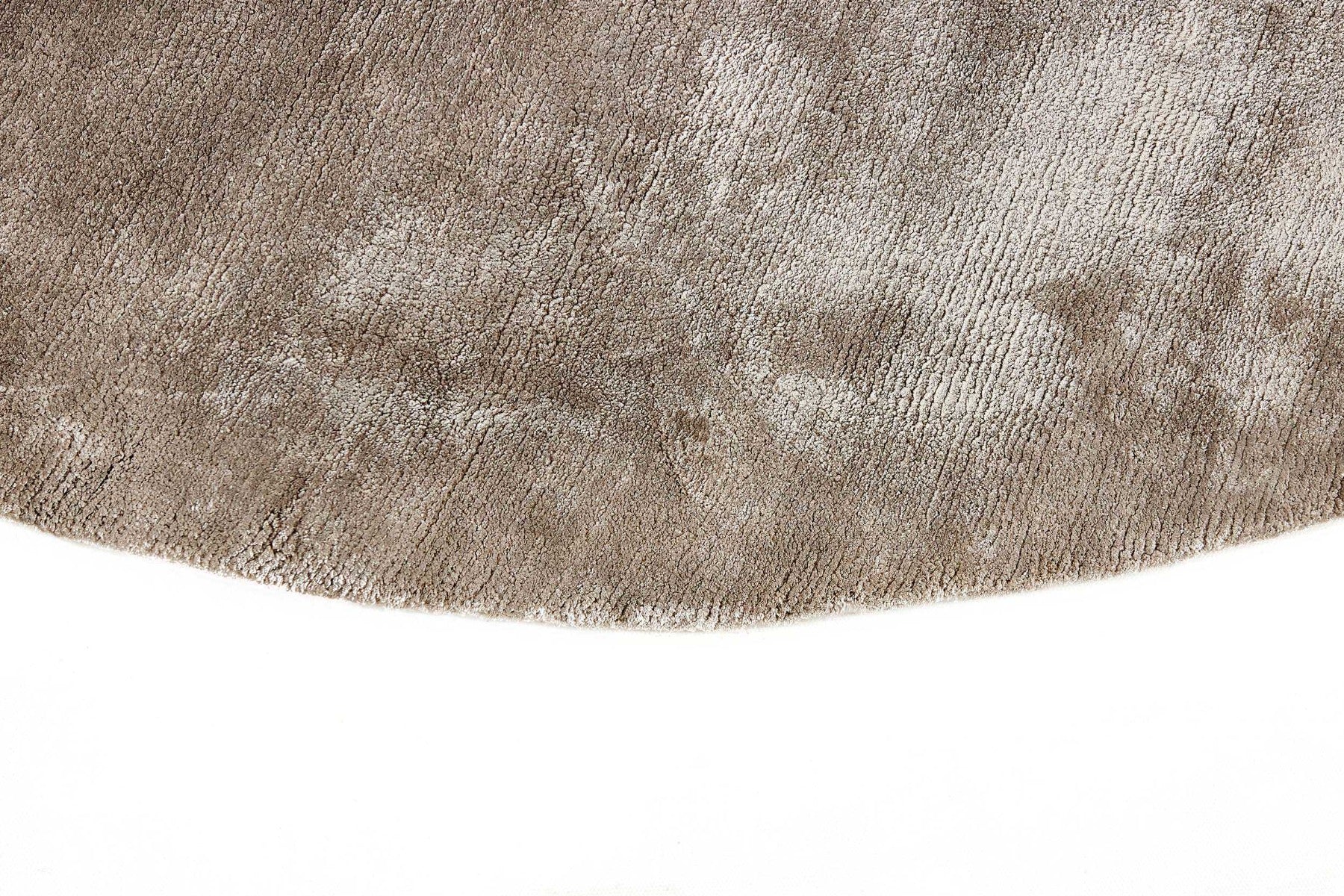 plain light grey circle rug
