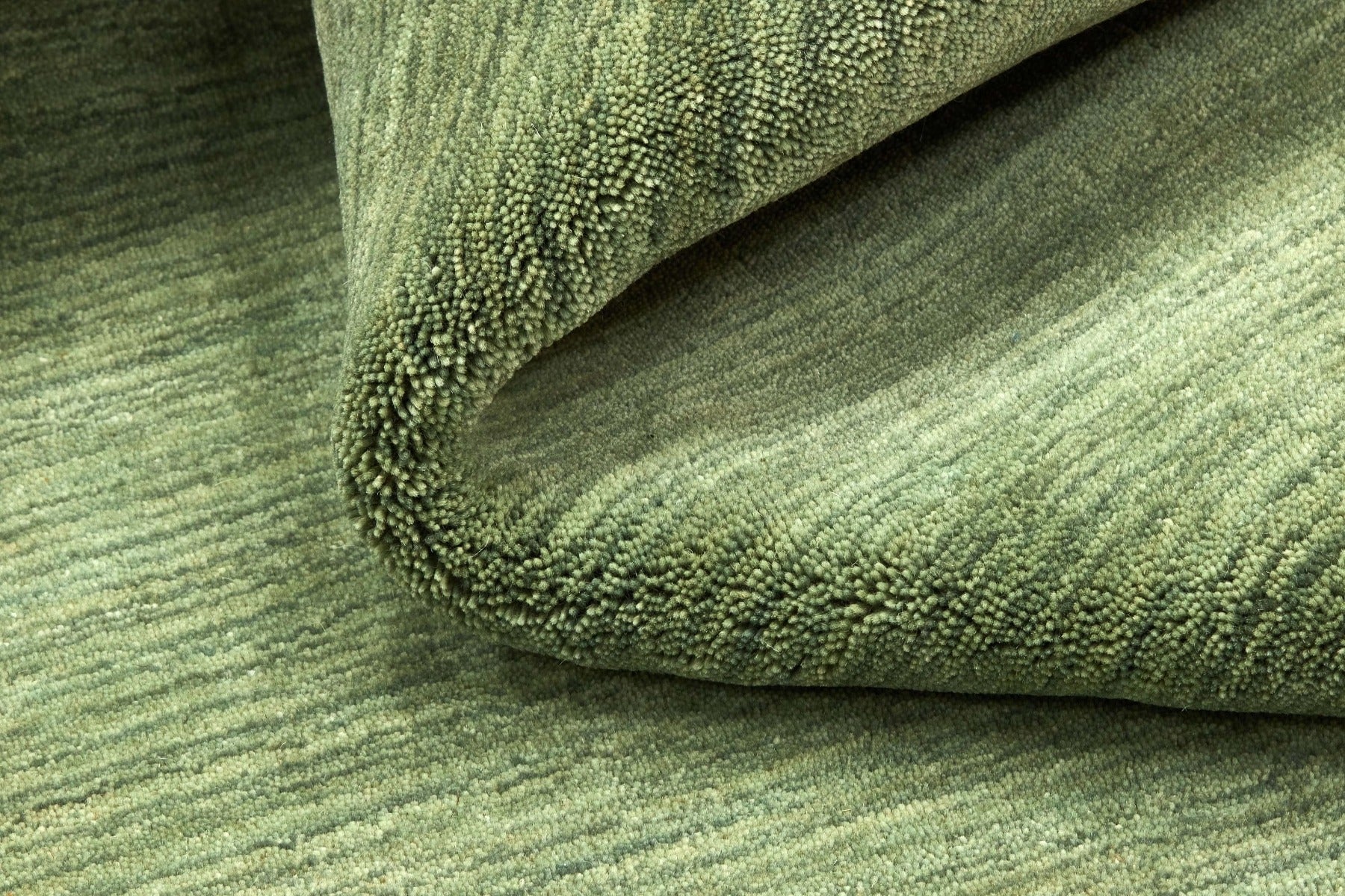 plain green wool area rug