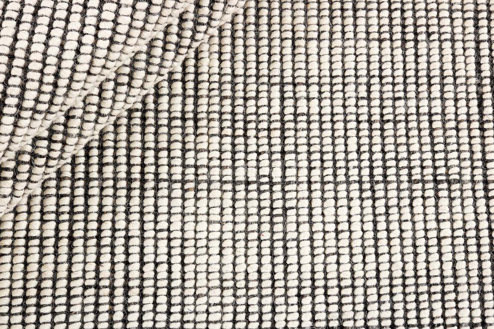 Dark grey and white textured flatweave rug
