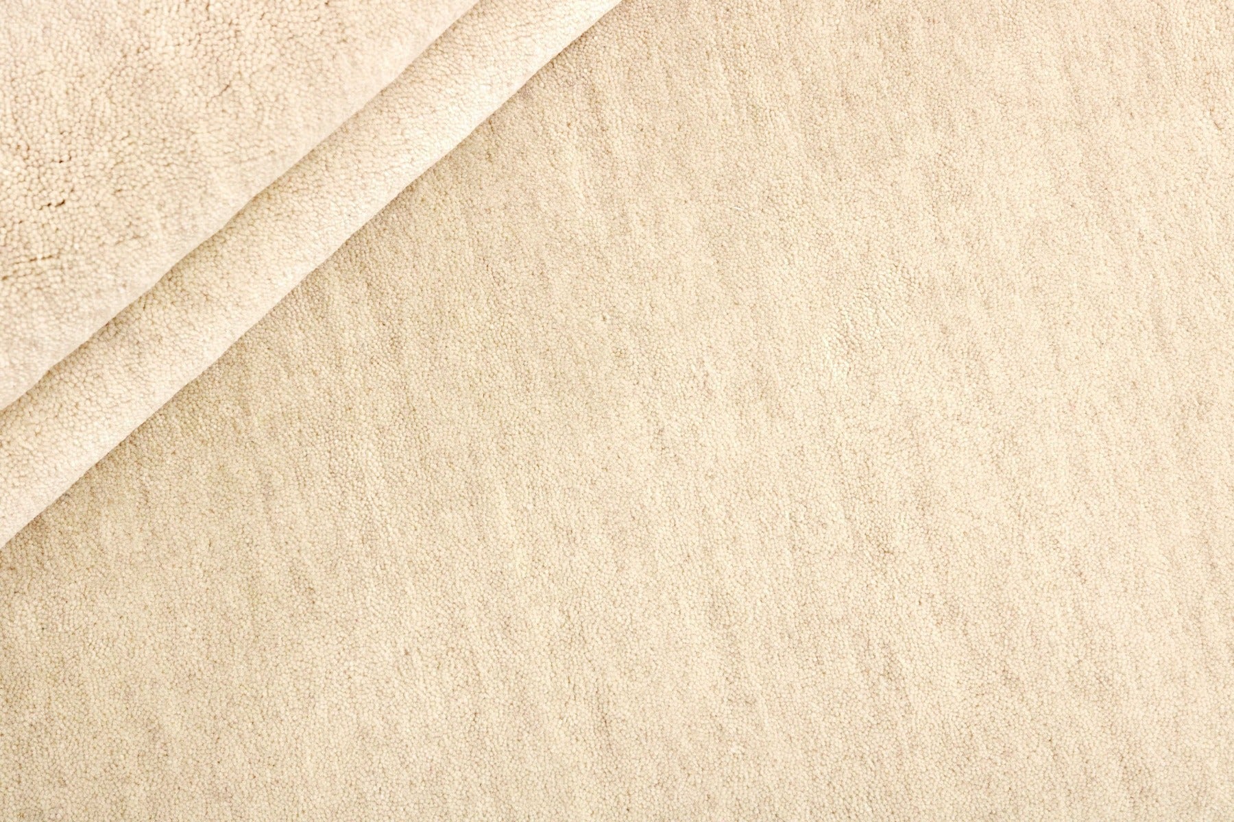 plain cream wool circle rug
