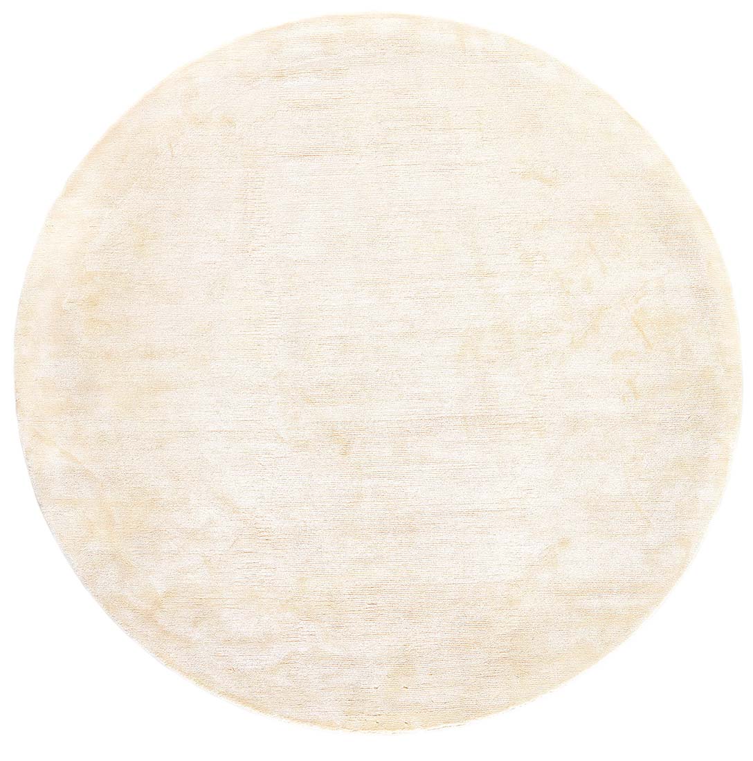 large plain beige viscose circle rug

