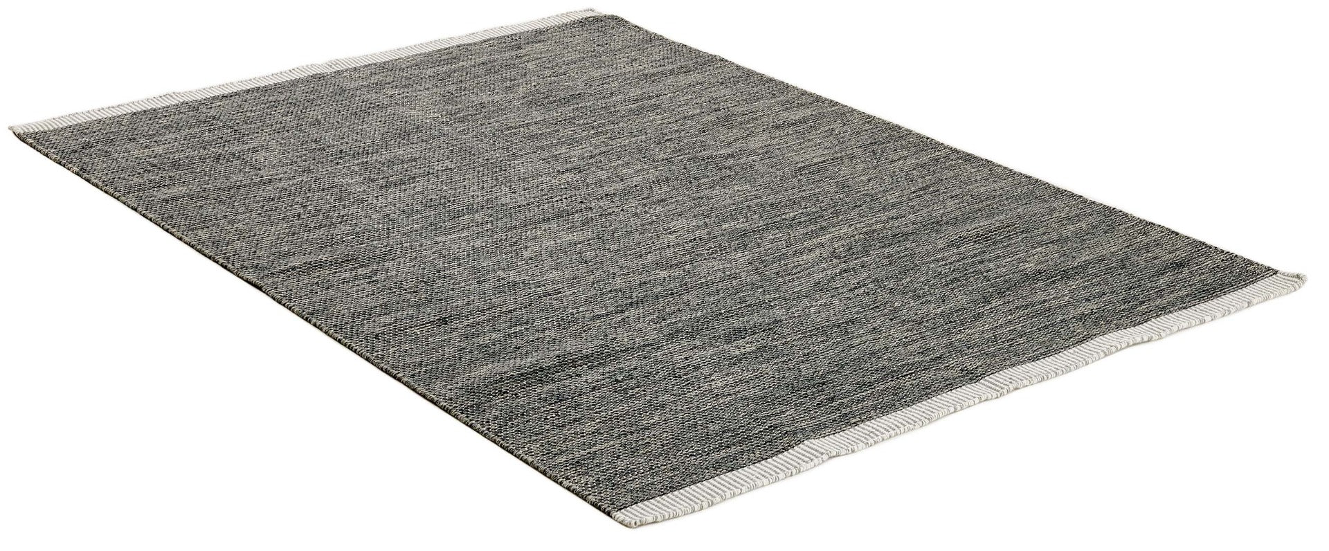 plain black and green flatweave wool rug
