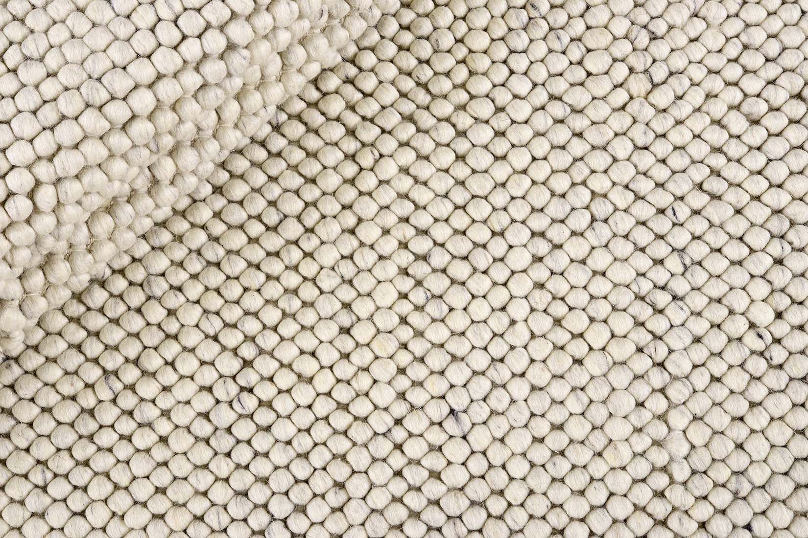 cream textured wool rug

